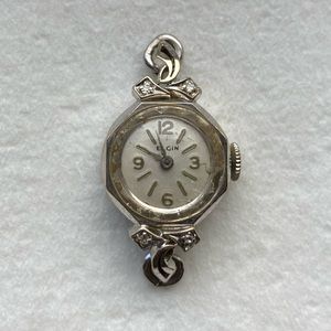 Vintage 14k gold Elgin watch with diamond accents